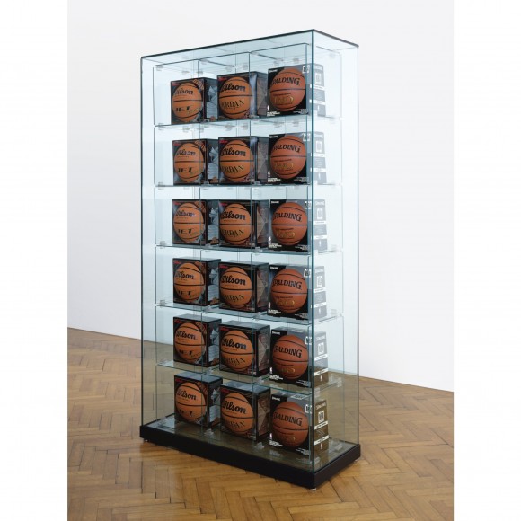 JEFF KOONS
Encased - Three Rows (6 Wilson Jet Basketballs, 6 Wilson Michael Jordan Basketballs, 6 Spalding Zi/O Basketballs)
1983-1993/98
Glass, plastic, steel, basketballs
203.2 x 108 x 43.8cm
Image courtesy of Private Collection, London